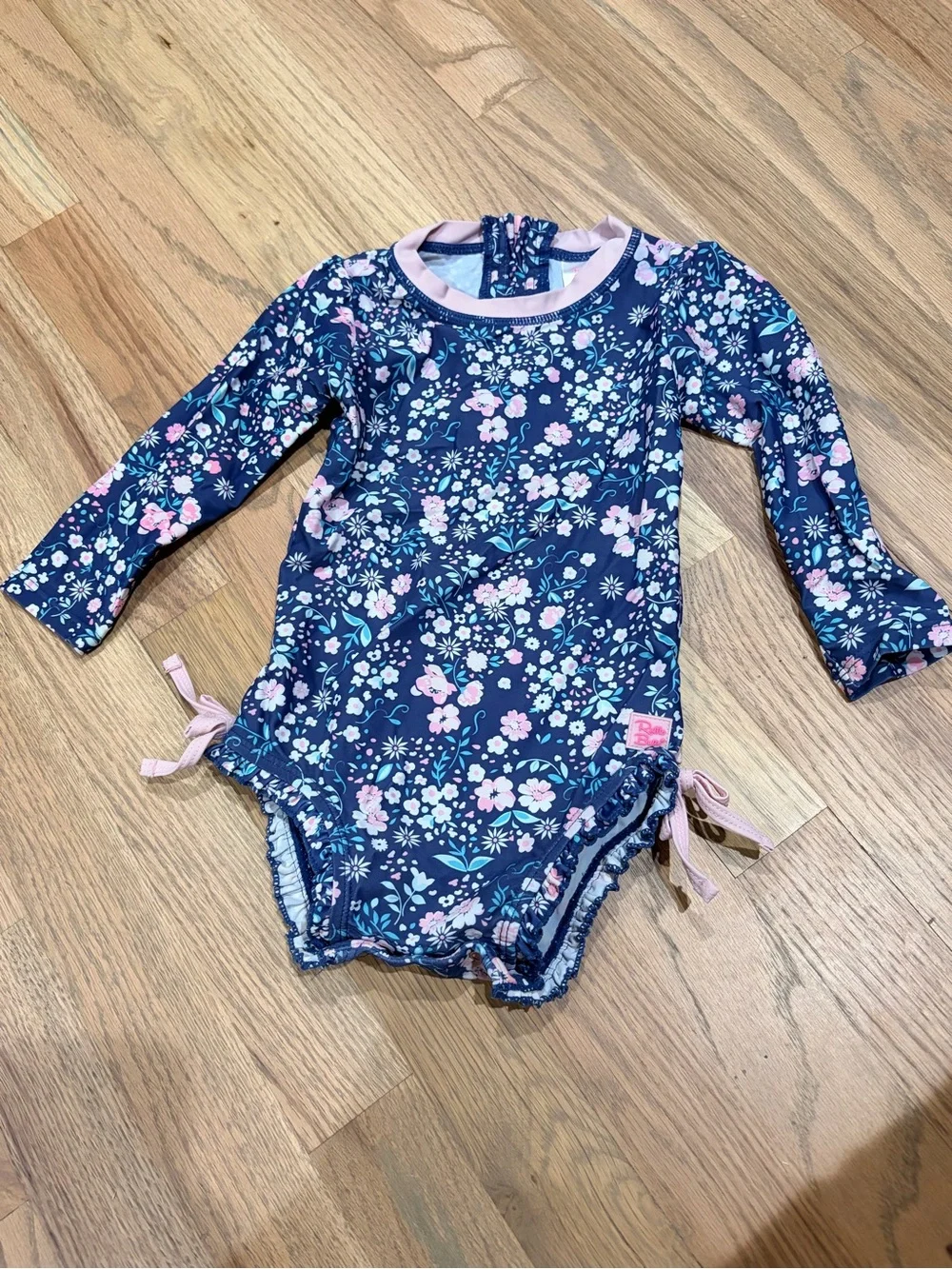 Rufflebutts toddler girl floral rashguard bathing suit with snap closure